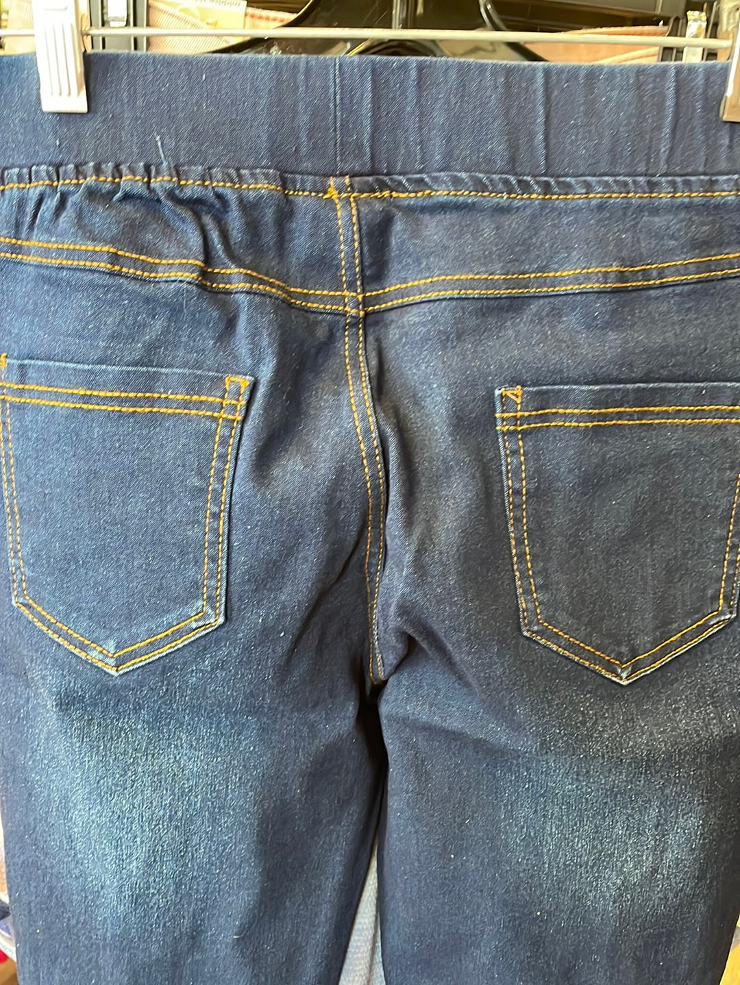 Pull on distressed denim jeggings