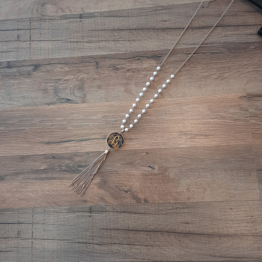 33” monogram shell pearl chain with tassel necklace