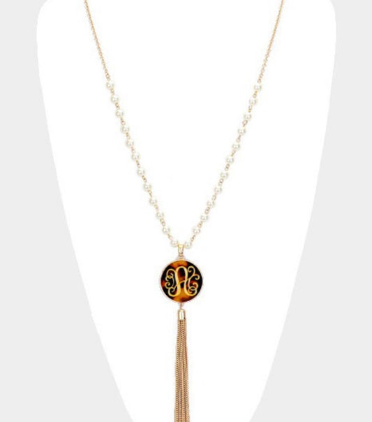 33” monogram shell pearl chain with tassel necklace